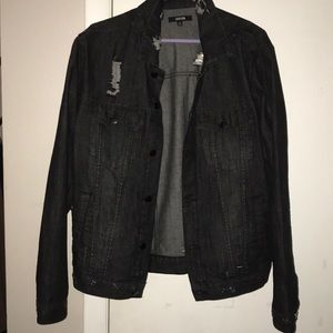 Black jean jacket with some small rips